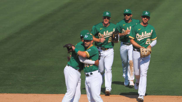 A's infielders, outfielders celebrate Game 2 win